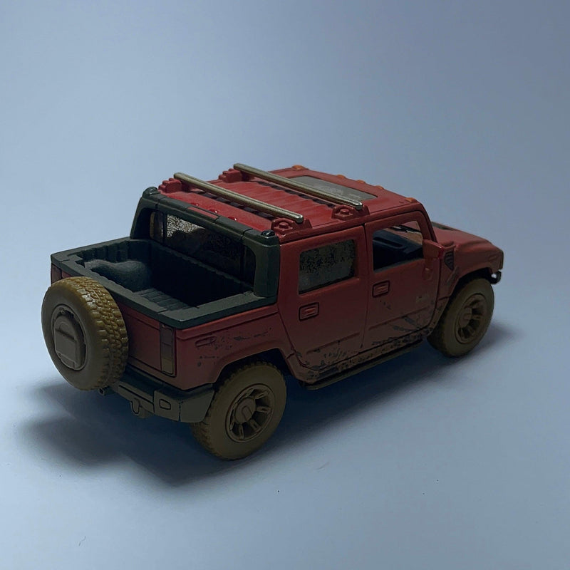 Miniatura Carro Hummer H2 SUT Vermelho Sujo de Lama Escala 1/36 - MiniTurbo